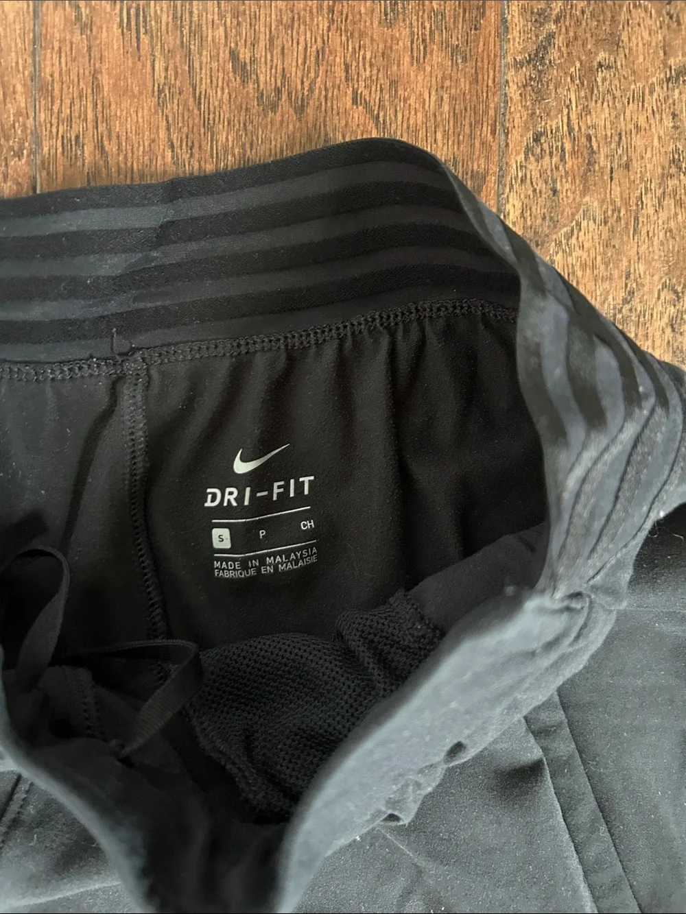 Nike Black women’s size S Performance Leggings with White Swoosh